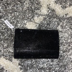Aldo black rhinestone crossbody with silver chain.